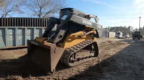 Grading A Drainage Swale With A Skid Steer 